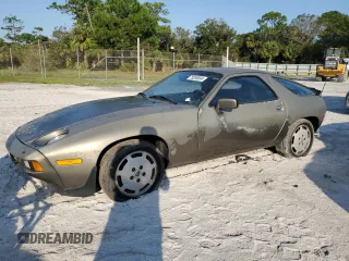 1984 Porsche 928 z VIN WP0JB0927ES862274, wystawiony jako Copart lot #75285934 z przebiegiem 97 509 mil mil oraz Tytuł czysty. Historia ofert i sprzedaży dostępna na DreamBid. Obrazek 1.