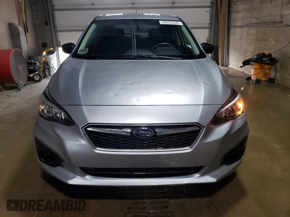 2018 Subaru Impreza с VIN 4S3GTAA61J3714928, выставлен на аукционе Copart как лот 59552555 с пробегом 59 125 миль миль и Списание • Salvage title. История ставок и продаж доступна на DreamBid. Изображение 5.