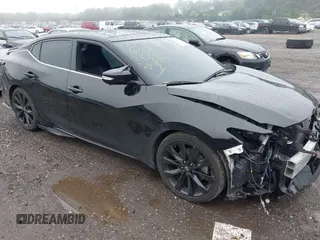 2023 Nissan Maxima SR with VIN 1N4AA6EV1PC513796, listed as a IAAI auction lot 42517903 with 23,304 mi miles and . Bid and sale history available at DreamBid. Image 1.