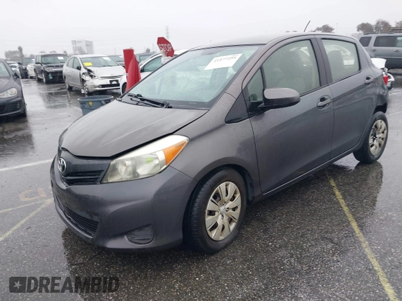 2013 Toyota Yaris L with VIN JTDKTUD39DD552185, listed as a IAAI auction lot 41577259 with 159,662 mi miles. Bid and sale history available at carsss.com. Image 2.