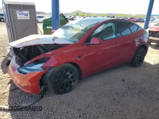 2022 Tesla Model Y Long Range z VIN 7SAYGDEE3NF436119, wystawiony jako Copart lot #54892115 z przebiegiem 27 054 mil mil oraz Szkody całkowita. Historia ofert i sprzedaży dostępna na DreamBid. Obrazek 1.