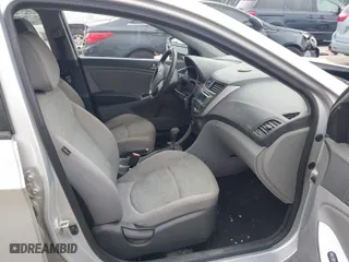 2015 Hyundai Accent GLS with VIN KMHCT4AE7FU849786, listed as a IAAI auction lot 41965237 with 98,587 mi miles. Bid and sale history available at carsss.com. Image 5.