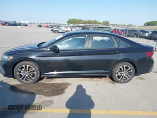 2023 Volkswagen Jetta Sport with VIN 3VWBM7BU2PM022530, listed as a IAAI auction lot 42215101 with 7,455 mi miles and . Bid and sale history available at DreamBid. Image 14.
