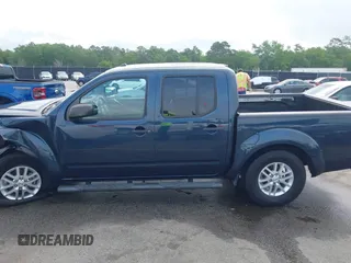 2016 Nissan Frontier SV z VIN 1N6AD0ER6GN799373, wystawiony jako IAAI lot #42093477 z przebiegiem 38 620 mil mil oraz . Historia ofert i sprzedaży dostępna na DreamBid. Obrazek 14.