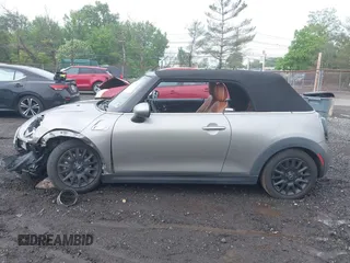 2016 MINI Convertible S z VIN WMWWG9C53G3A91095, wystawiony jako IAAI lot #42283353 z przebiegiem Nie podano mil oraz . Historia ofert i sprzedaży dostępna na DreamBid. Obrazek 14.