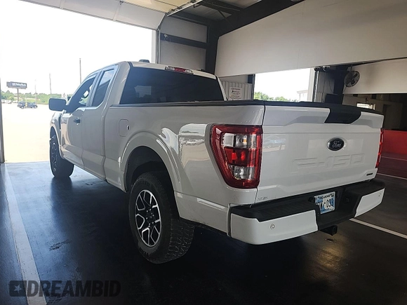 2023 Ford F-150 XL with VIN 1FTEX1EP1PKD56789, listed as a IAAI auction lot 42802275 with 52,497 mi miles and . Bid and sale history available at DreamBid. Image 7.