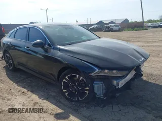 2023 Kia K5 GT-Line z VIN 5XXG64J22PG186976, wystawiony jako IAAI lot #42241886 z przebiegiem 39 502 mil mil oraz . Historia ofert i sprzedaży dostępna na DreamBid. Obrazek 1.