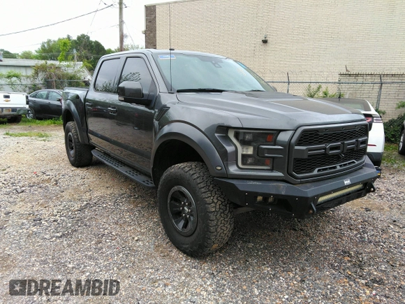 2017 Ford F-150 Raptor with VIN 1FTFW1RG8HFA31164, listed as a IAAI auction lot 42125542 with 164,745 mi miles and . Bid and sale history available at carsss.com. Image 1.