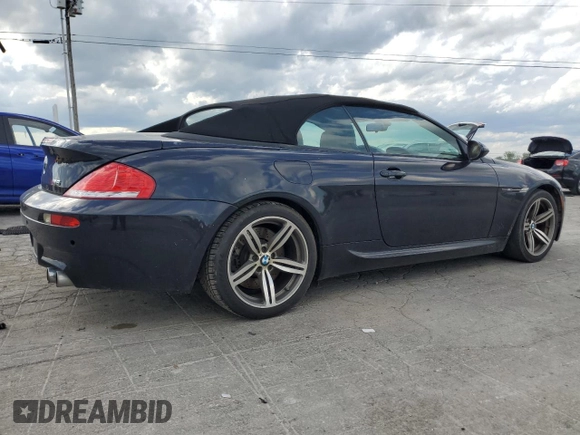 2009 BMW 6 Series M6 z VIN WBSEK93599CY80065, wystawiony jako Copart lot #55277505 z przebiegiem 125 557 mil mil oraz Tytuł czysty. Historia ofert i sprzedaży dostępna na DreamBid. Obrazek 3.