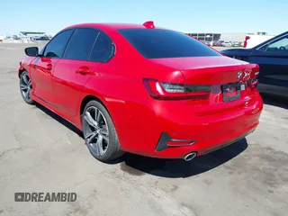 2022 BMW 3 Series 330i with VIN 3MW5R1J09N8C52274, listed as a IAAI auction lot 42052851 with 30,897 mi miles. Bid and sale history available at carsss.com. Image 3.