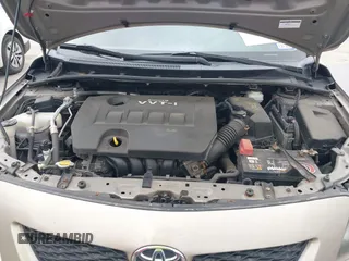 2009 Toyota Corolla with VIN 1NXBU40E99Z118081, listed as a IAAI auction lot 42086882 with 199,328 mi miles and . Bid and sale history available at DreamBid. Image 10.