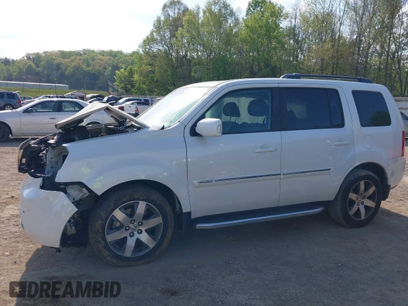 2013 Honda Pilot Touring with VIN 5FNYF3H92DB034731, listed as a IAAI auction lot 42049853 with 127,278 mi miles and . Bid and sale history available at DreamBid. Image 14.