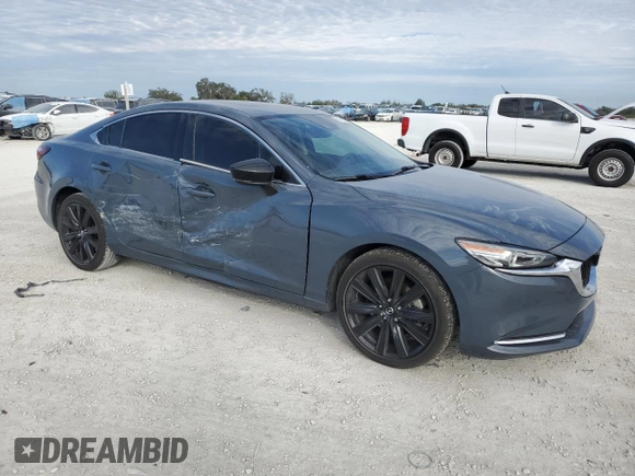 2021 Mazda 6 Carbon Edition with VIN JM1GL1WY6M1618139, listed as a Copart auction lot 88761045 with 82,377 mi miles and Non Repairable. Bid and sale history available at DreamBid. Image 4.