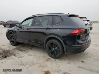 2023 Volkswagen Tiguan SE R-Line Black with VIN 3VVCB7AX0PM115167, listed as a Copart auction lot 48349595 with 36,962 mi miles and Salvage Title. Bid and sale history available at carsss.com. Image 2.