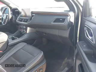 2023 Chevrolet Suburban Premier z VIN 1GNSCFKD4PR378869, wystawiony jako IAAI lot #41802386 z przebiegiem 58 569 mil mil oraz . Historia ofert i sprzedaży dostępna na DreamBid. Obrazek 5.
