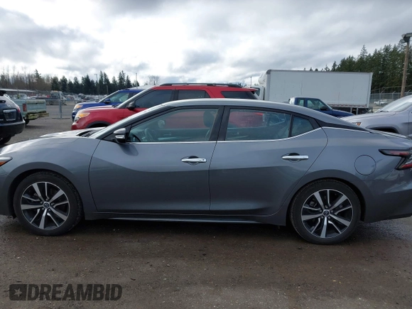 2023 Nissan Maxima SV with VIN 1N4AA6CV4PC512497, listed as a IAAI auction lot 41760990 with 32,400 mi miles and . Bid and sale history available at DreamBid. Image 14.