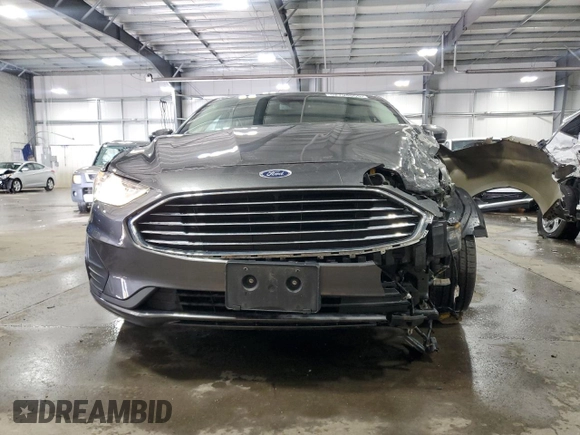 2019 Ford Fusion Hybrid SE with VIN 3FA6P0LU9KR287187, listed as a Copart auction lot 52704565 with 52,543 mi miles and Salvage Title. Bid and sale history available at carsss.com. Image 5.