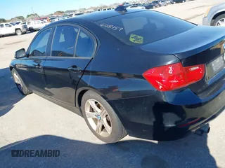 2015 BMW 3 Series 328i with VIN WBA3A5C55FF608159, listed as a IAAI auction lot 41255978 with 199,024 mi miles. Bid and sale history available at carsss.com. Image 3.