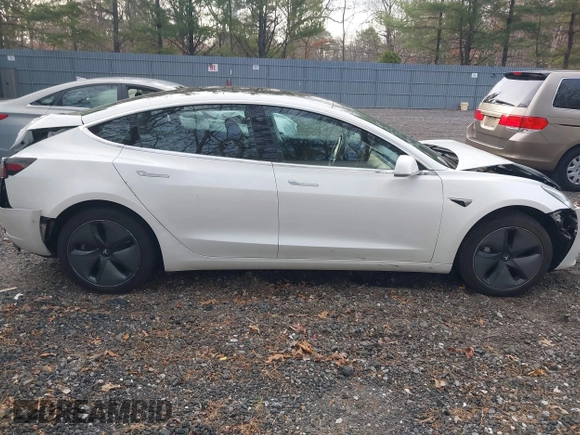 2020 Tesla Model 3 Long Range with VIN 5YJ3E1EB6LF618931, listed as a IAAI auction lot 41867451 with 47,502 mi miles and . Bid and sale history available at DreamBid. Image 13.