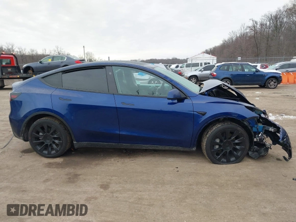 2025 Tesla Model Y Long Range with VIN 7SAYGDED9SF248370, listed as a IAAI auction lot 41336869 with 2,499 mi miles and . Bid and sale history available at DreamBid. Image 14.