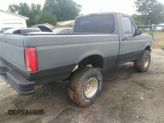 1994 Ford F-150 with VIN 1FTEF14Y2RNA90651, listed as a IAAI auction lot 42699550 with Not provided miles and . Bid and sale history available at DreamBid. Image 4.
