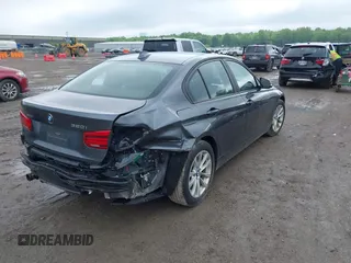 2018 BMW 3 Series 320i xDrive with VIN WBA8A3C5XJA505917, listed as a IAAI auction lot 42279882 with 89,537 mi miles and . Bid and sale history available at DreamBid. Image 4.