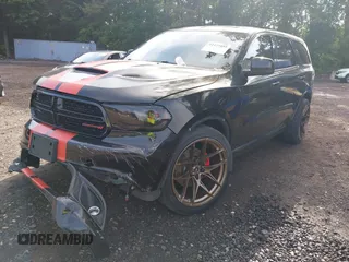 2014 Dodge Durango R/T with VIN 1C4SDJCT5EC503358, listed as a IAAI auction lot 42491055 with 118,862 mi miles and . Bid and sale history available at DreamBid. Image 2.