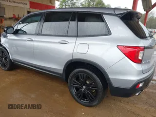 2021 Honda Passport Sport with VIN 5FNYF7H26MB014556, listed as a IAAI auction lot 41683680 with 97,829 mi miles and . Bid and sale history available at carsss.com. Image 3.