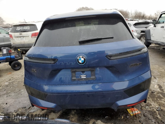 2023 BMW iX M60 with VIN WB533CF01PCM75951, listed as a Copart auction lot 42005405 with 13,540 mi miles and Salvage Title. Bid and sale history available at carsss.com. Image 6.