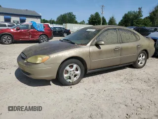 2003 Ford Taurus SES Standard z VIN 1FAFP55S53A141678, wystawiony jako Copart lot #56908885 z przebiegiem Nie podano mil oraz Czysty tytuł • Clean title. Historia ofert i sprzedaży dostępna na DreamBid. Obrazek 1.