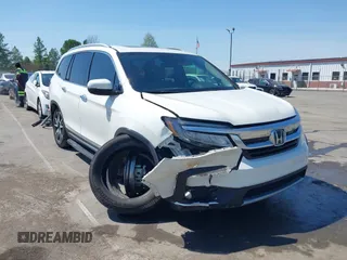 2019 Honda Pilot Touring 8-Passenger z VIN 5FNYF5H93KB021978, wystawiony jako IAAI lot #41915333 z przebiegiem 82 676 mil mil oraz . Historia ofert i sprzedaży dostępna na DreamBid. Obrazek 6.