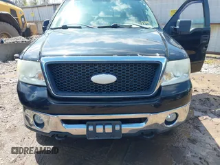 2007 Ford F-150 XLT with VIN 1FTPW14V67KC70678, listed as a IAAI auction lot 42002237 with 309,291 mi miles. Bid and sale history available at carsss.com. Image 6.