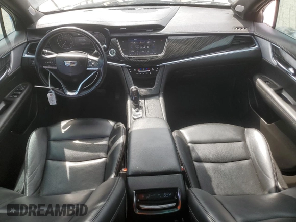 2023 Cadillac XT6 FWD Premium Luxury with VIN 1GYKPCRS6PZ127331, listed as a Copart auction lot 52951105 with 47,796 mi miles and Salvage Title. Bid and sale history available at carsss.com. Image 8.