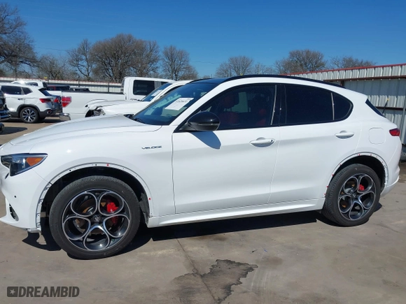 2023 Alfa Romeo Stelvio Ti with VIN ZASPAKBN4P7D63524, listed as a IAAI auction lot 41626631 with 37,731 mi miles. Bid and sale history available at carsss.com. Image 20.