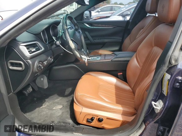 2015 Maserati Ghibli S Q4 z VIN ZAM57RTA1F1161983, wystawiony jako Copart lot #54793155 z przebiegiem 102 487 mil mil oraz Tytuł czysty. Historia ofert i sprzedaży dostępna na DreamBid. Obrazek 7.