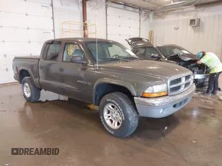 2001 Dodge Dakota Sport with VIN 1B7HG2AN21S348229, listed as a IAAI auction lot 42464396 with 47,854 mi miles and . Bid and sale history available at DreamBid. Image 1.