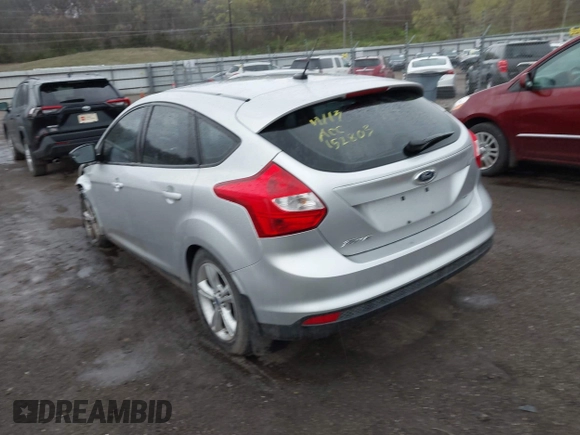 2012 Ford Focus SE z VIN 1FAHP3K27CL152803, wystawiony jako IAAI lot #42058556 z przebiegiem 181 717 mil mil oraz . Historia ofert i sprzedaży dostępna na DreamBid. Obrazek 3.
