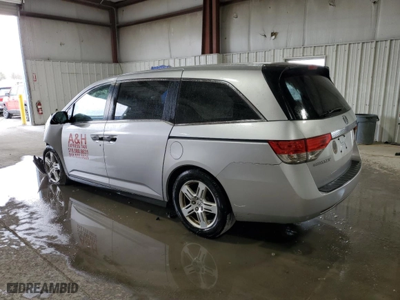 2015 Honda Odyssey LX with VIN 5FNRL5H27FB106960, listed as a Copart auction lot 51207935 with 144,668 mi miles and Salvage Title. Bid and sale history available at carsss.com. Image 2.