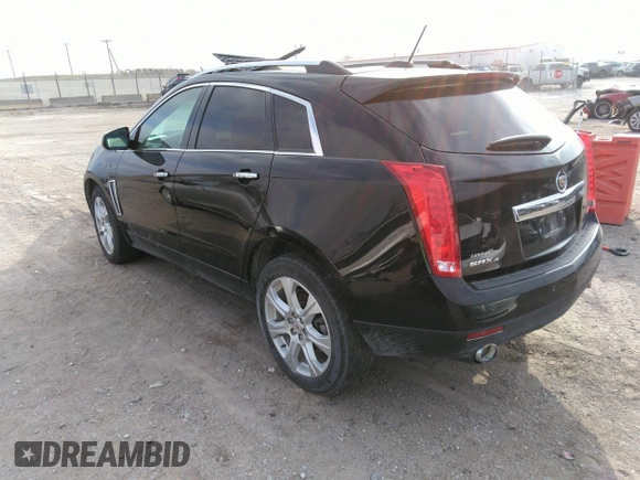 2016 Cadillac SRX Performance Collection z VIN 3GYFNCE32GS505552, wystawiony jako IAAI lot #40949642 z przebiegiem 143 343 mil mil oraz . Historia ofert i sprzedaży dostępna na DreamBid. Obrazek 3.