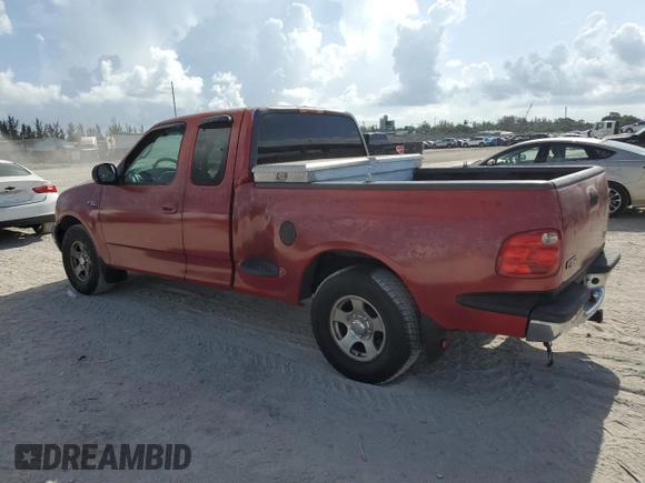 2000 Ford F-150 XL with VIN 2FTZX0724YCA62788, listed as a Copart auction lot 60301585 with Not provided miles and Clean title. Bid and sale history available at DreamBid. Image 2.