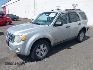 2008 Ford Escape XLT with VIN 1FMCU93168KA42503, listed as a IAAI auction lot 42109952 with 207,345 mi miles and . Bid and sale history available at DreamBid. Image 2.