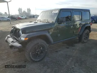 2021 Jeep Wrangler Unlimited Willys with VIN 1C4HJXDM0MW655574, listed as a Copart auction lot 82288524 with 34,986 mi miles and Salvage Title. Bid and sale history available at DreamBid. Image 1.