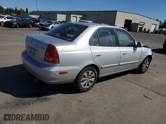 2005 Hyundai Accent GLS with VIN KMHCG45C55U623340, listed as a Copart auction lot 59587304 with 275,364 mi miles and Salvage Title. Bid and sale history available at carsss.com. Image 3.