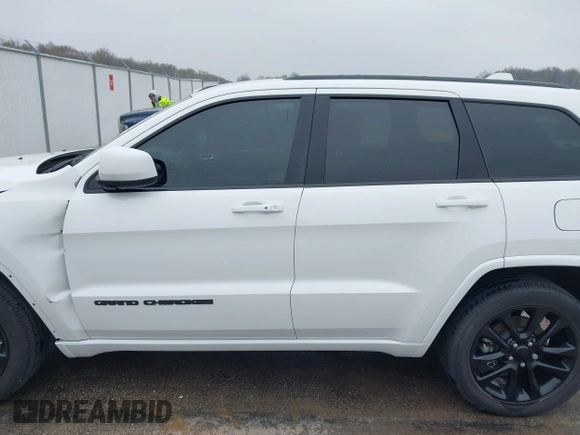 2021 Jeep Grand Cherokee Laredo E with VIN 1C4RJEAG7MC713026, listed as a IAAI auction lot 42010894 with 37,336 mi miles and . Bid and sale history available at DreamBid. Image 15.