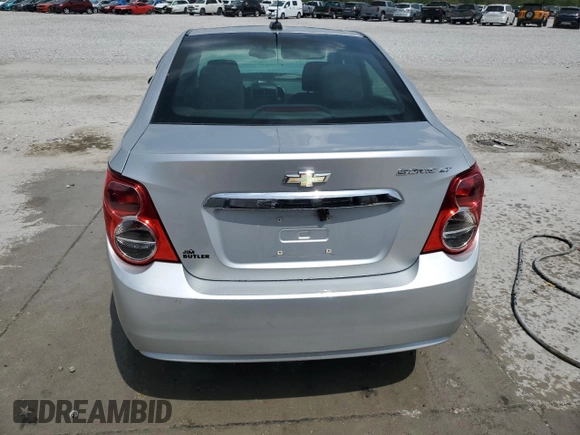 2015 Chevrolet Sonic LT z VIN 1G1JC5SHXF4108194, wystawiony jako Copart lot #54174955 z przebiegiem 146 443 mil mil oraz Szkoda całkowita • Salvage title. Historia ofert i sprzedaży dostępna na DreamBid. Obrazek 6.