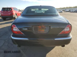 2006 Jaguar XJ with VIN SAJWA73C26TH03133, listed as a Copart auction lot 81796674 with 128,006 mi miles and Non repairable. Bid and sale history available at DreamBid. Image 6.