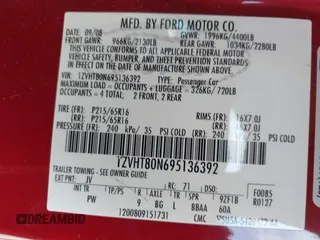 2009 Ford Mustang with VIN 1ZVHT80N695136392, listed as a IAAI auction lot 41509619 with 141,563 mi miles and . Bid and sale history available at carsss.com. Image 9.