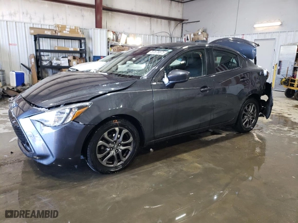 2019 Toyota Yaris Sedan L with VIN 3MYDLBYV8KY504326, listed as a Copart auction lot 87878875 with 73,392 mi miles and Salvage Title. Bid and sale history available at carsss.com. Image 1.
