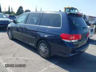 2008 Honda Odyssey LX with VIN 5FNRL38268B025424, listed as a IAAI auction lot 42432326 with 210,644 mi miles and . Bid and sale history available at DreamBid. Image 3.