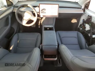 2023 Tesla Model Y Long Range z VIN 7SAYGDEE8PA069248, wystawiony jako Copart lot #74120944 z przebiegiem 17 085 mil mil oraz Szkoda całkowita • Salvage title. Historia ofert i sprzedaży dostępna na DreamBid. Obrazek 8.